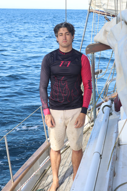 Person on a sailboat with a blue ocean background